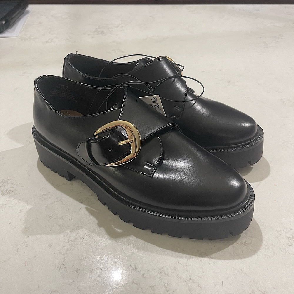 H&M black loafers with gold buckle